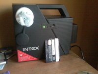 Intex UPS-50 in action with CFL bulb+ADSL router(not shown).jpg